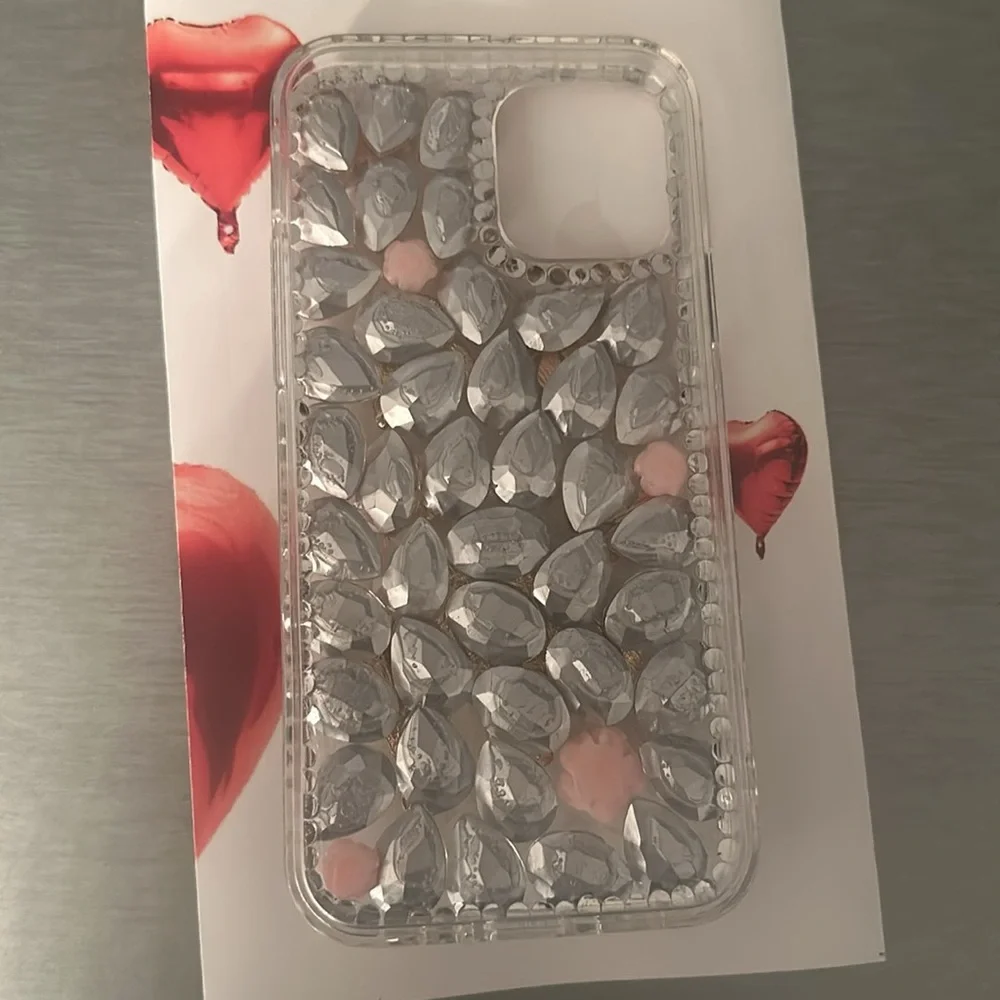 I phone 12 Pro protective cover.pink stones, white enamel flowers & elephant NWT